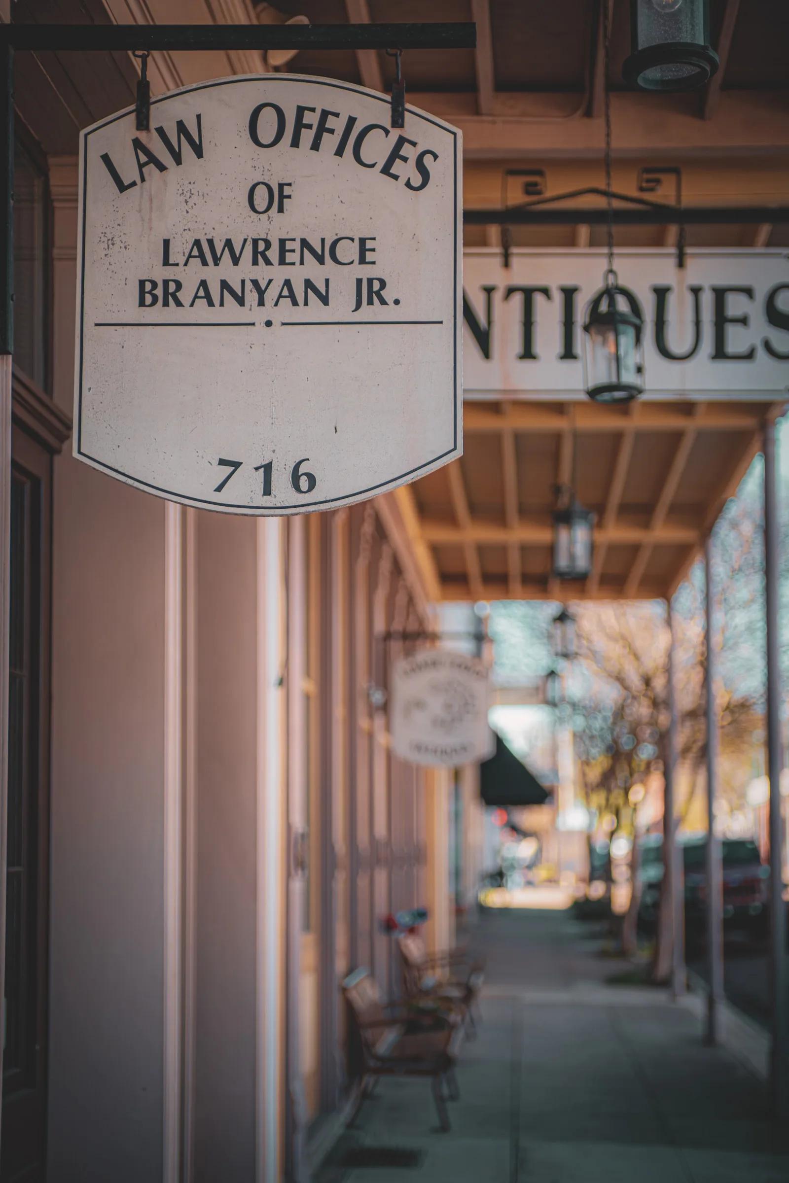 Brick sidewalk with awnings on Natchez main street